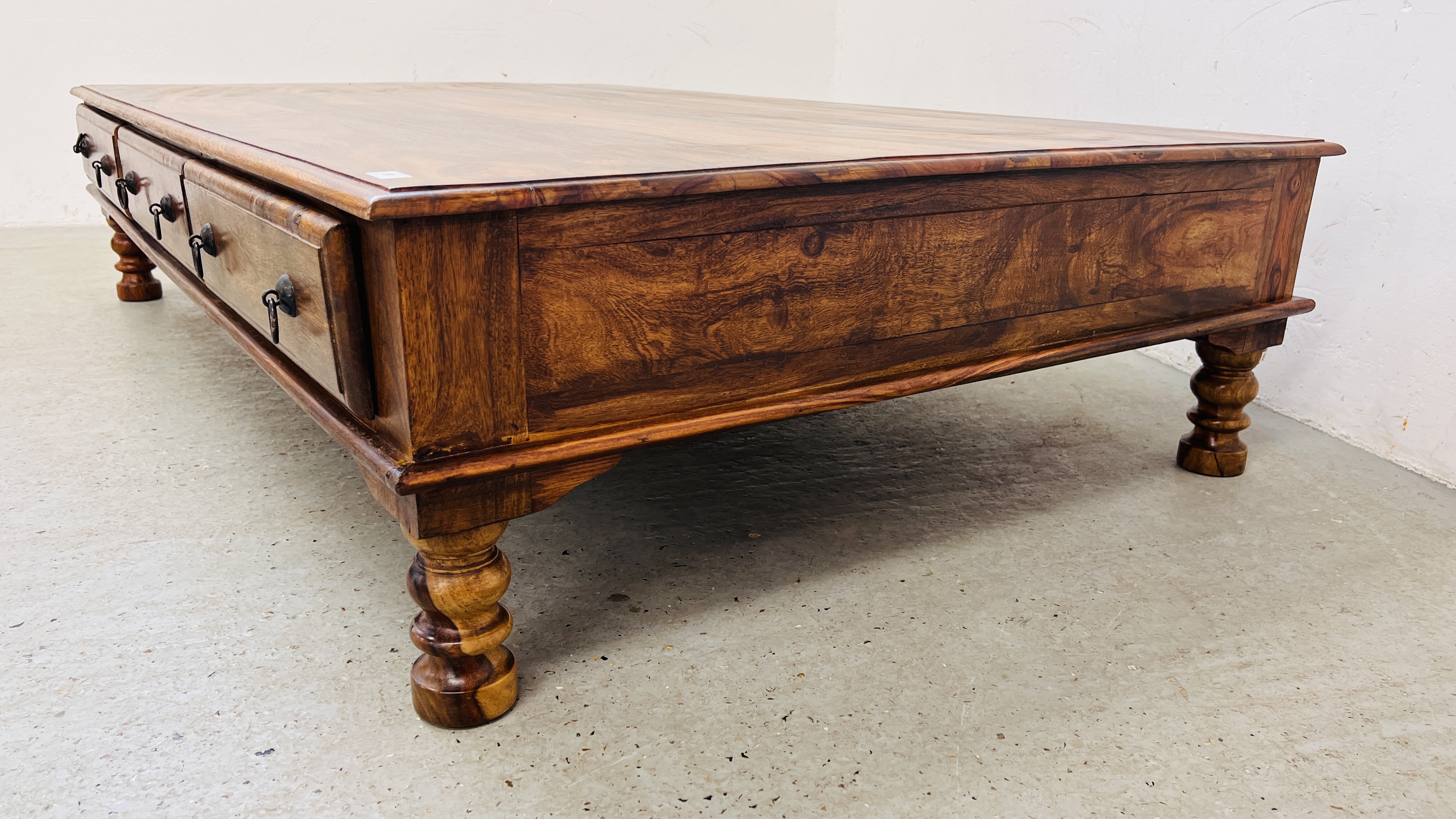 A MODERN ORIENTAL HARDWOOD COFFEE TABLE WITH FRIEZE DRAWERS 181CM. LONG. - Image 15 of 15