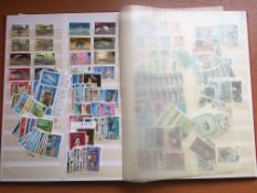 BOX WITH EXTENSIVE CHANNEL ISLANDS AND ISLE OF MAN STAMPS,