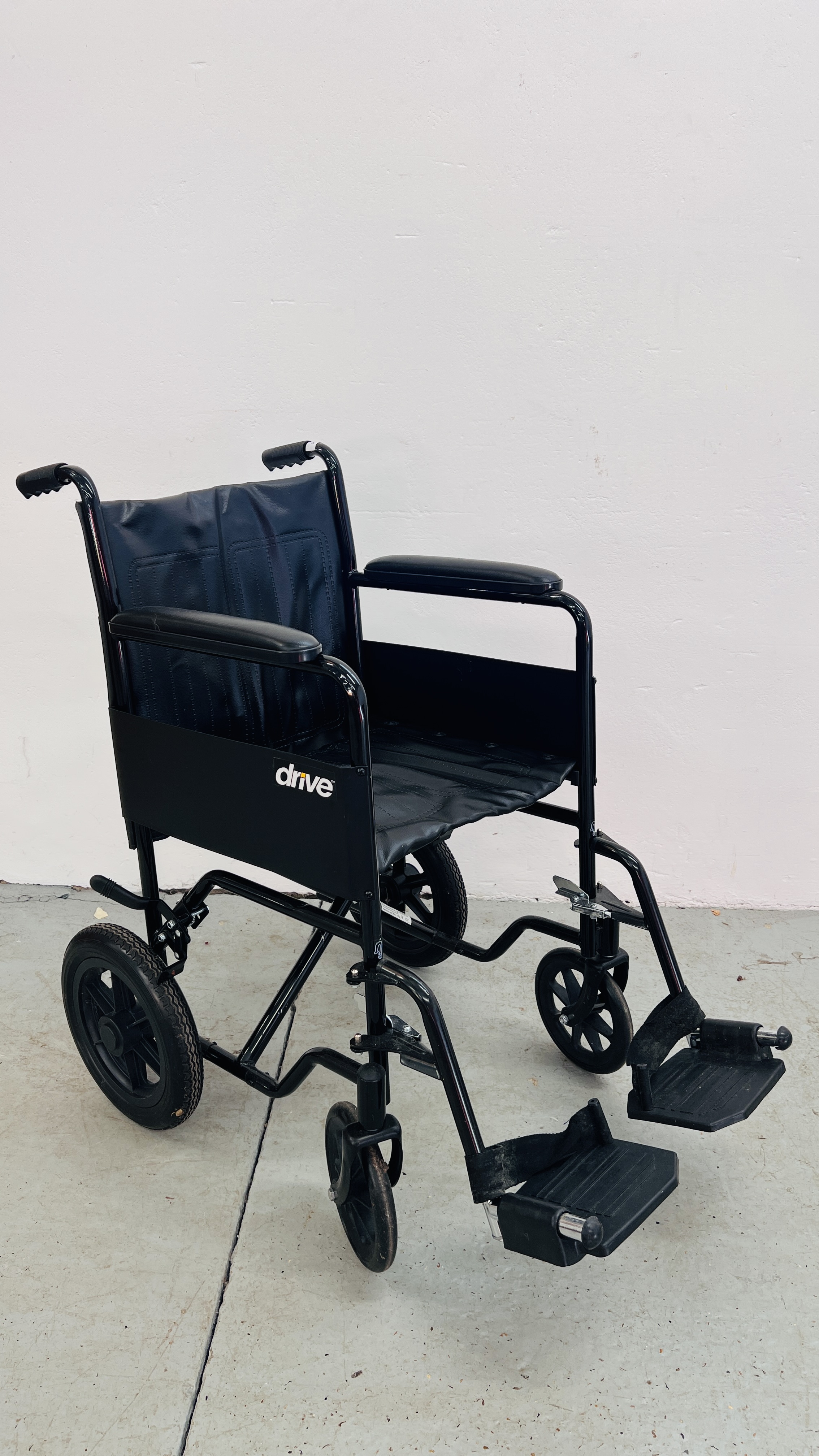 CARE CO FOLDING WHEELCHAIR.