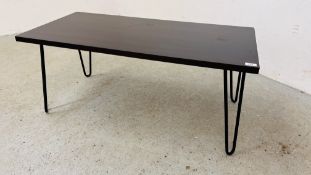 A MODERN RECTANGULAR COFFEE TABLE ON METAL U LEGS