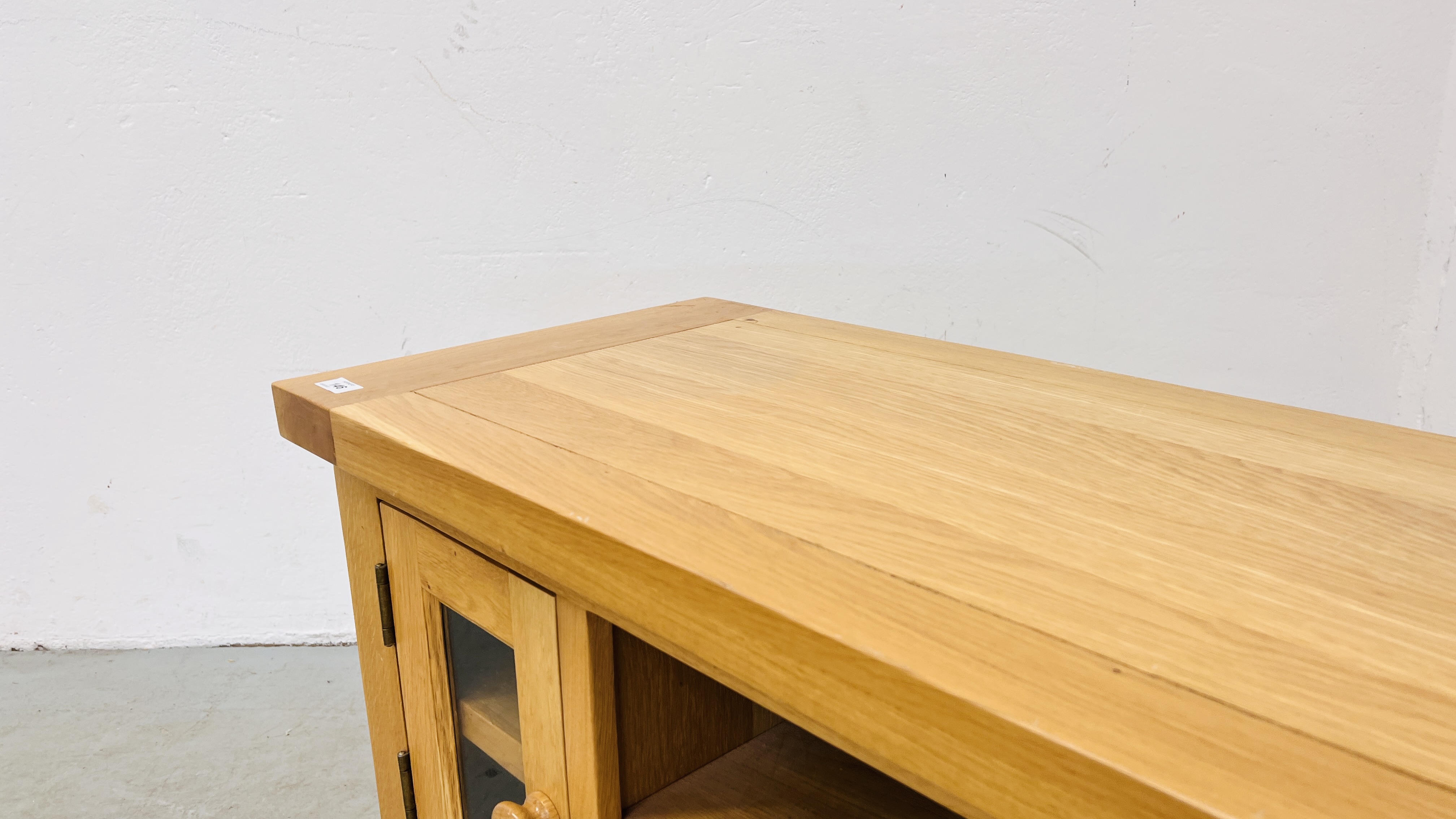 A SOLID LIGHT OAK TELEVISION STAND. - Image 6 of 9