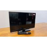 A LINSTAR 24" FLAT SCREEN TELEVISION SET - SOLD AS SEEN.