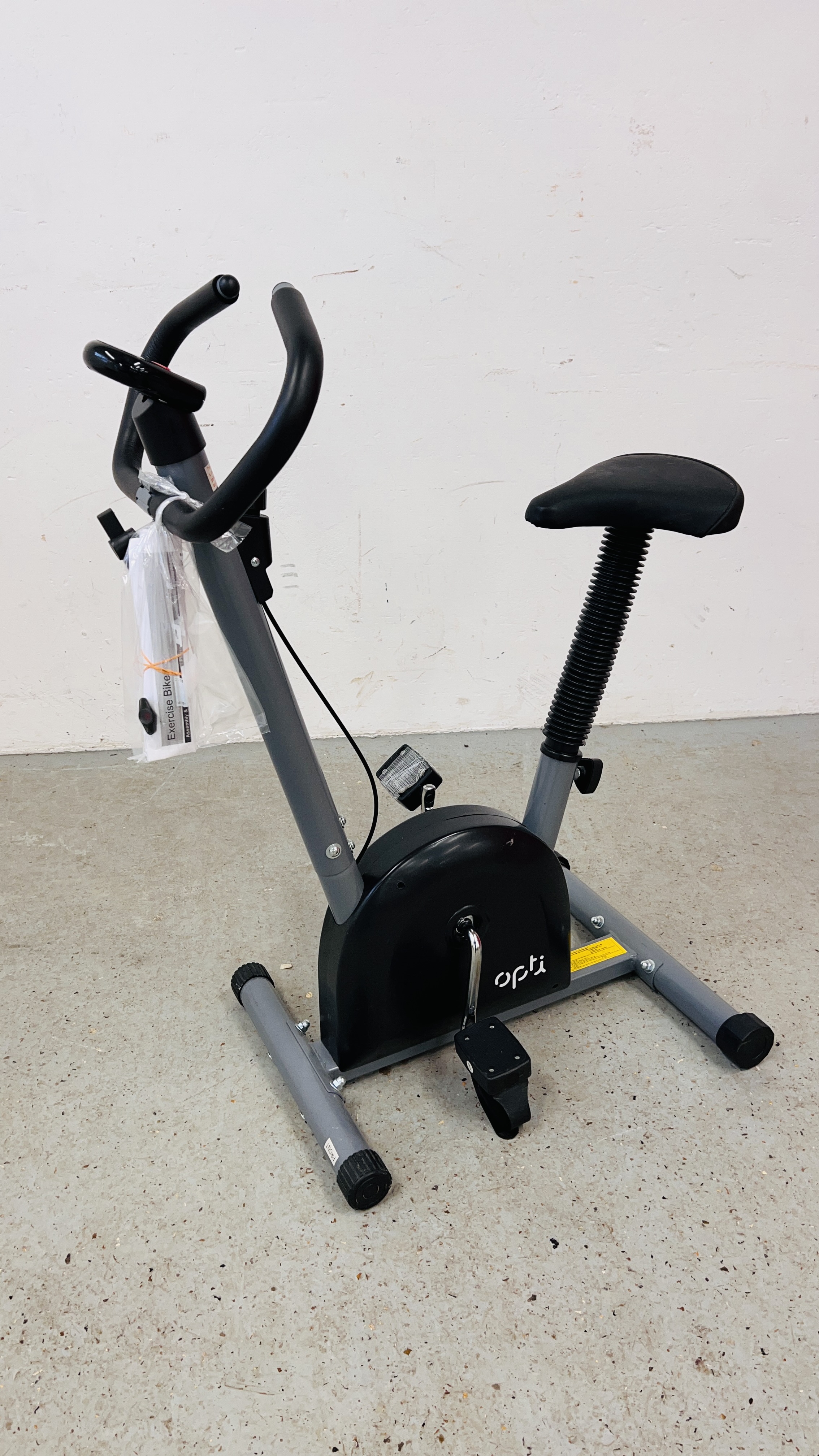 AN OPTI EXERCISE BIKE - SOLD AS SEEN