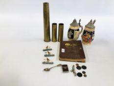 THREE BRASS TRENCH ART SHELLS, TWO GERMAN GLAZED STEINS, A GROUP OF THREE PAINTED LEAD FIGURES,