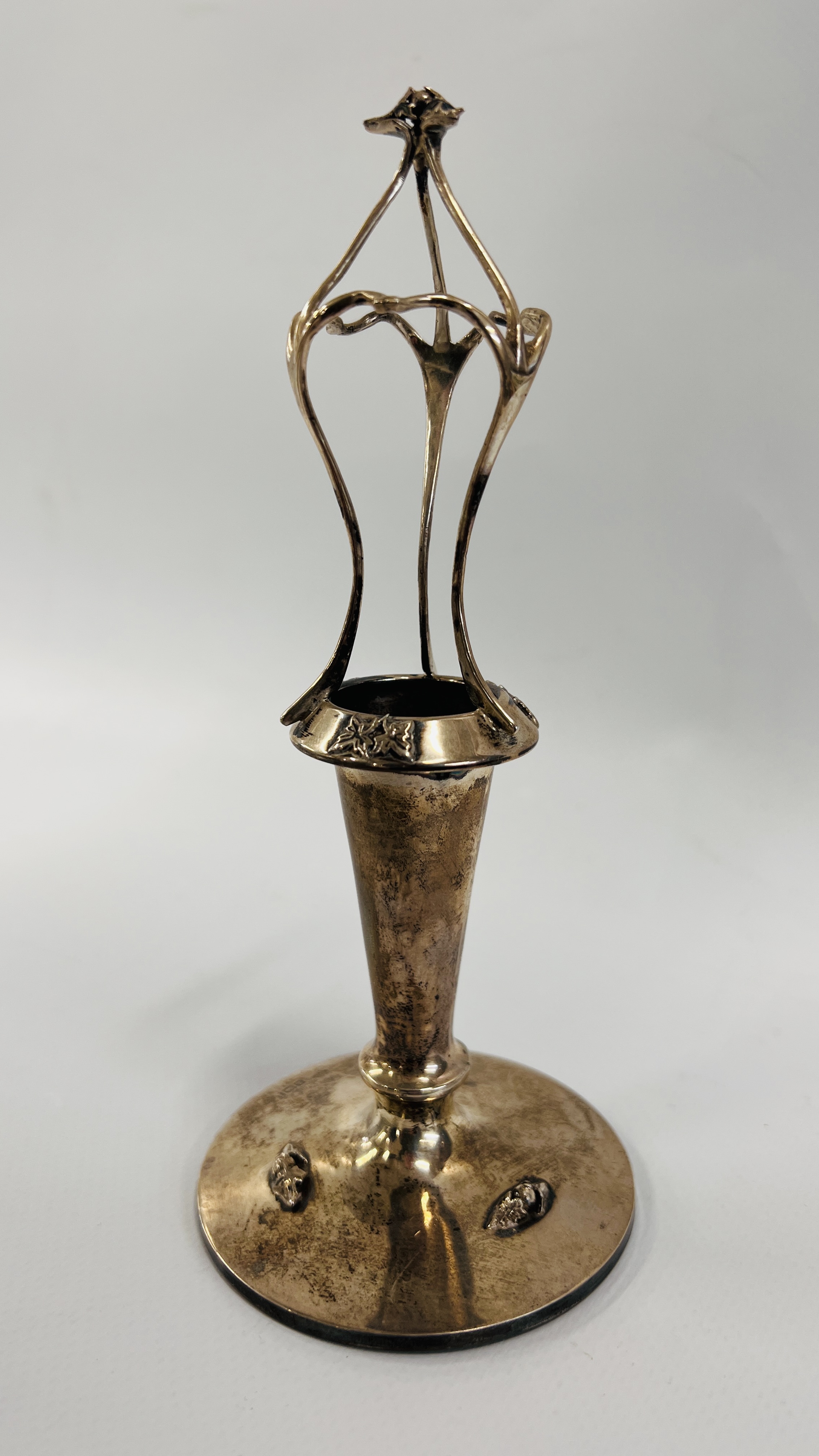 AN ANTIQUE SILVER HAT PIN STAND WITH APPLIED DECORATION, BIRMINGHAM ASSAY, RUBBED MAKERS MARK. H 16.