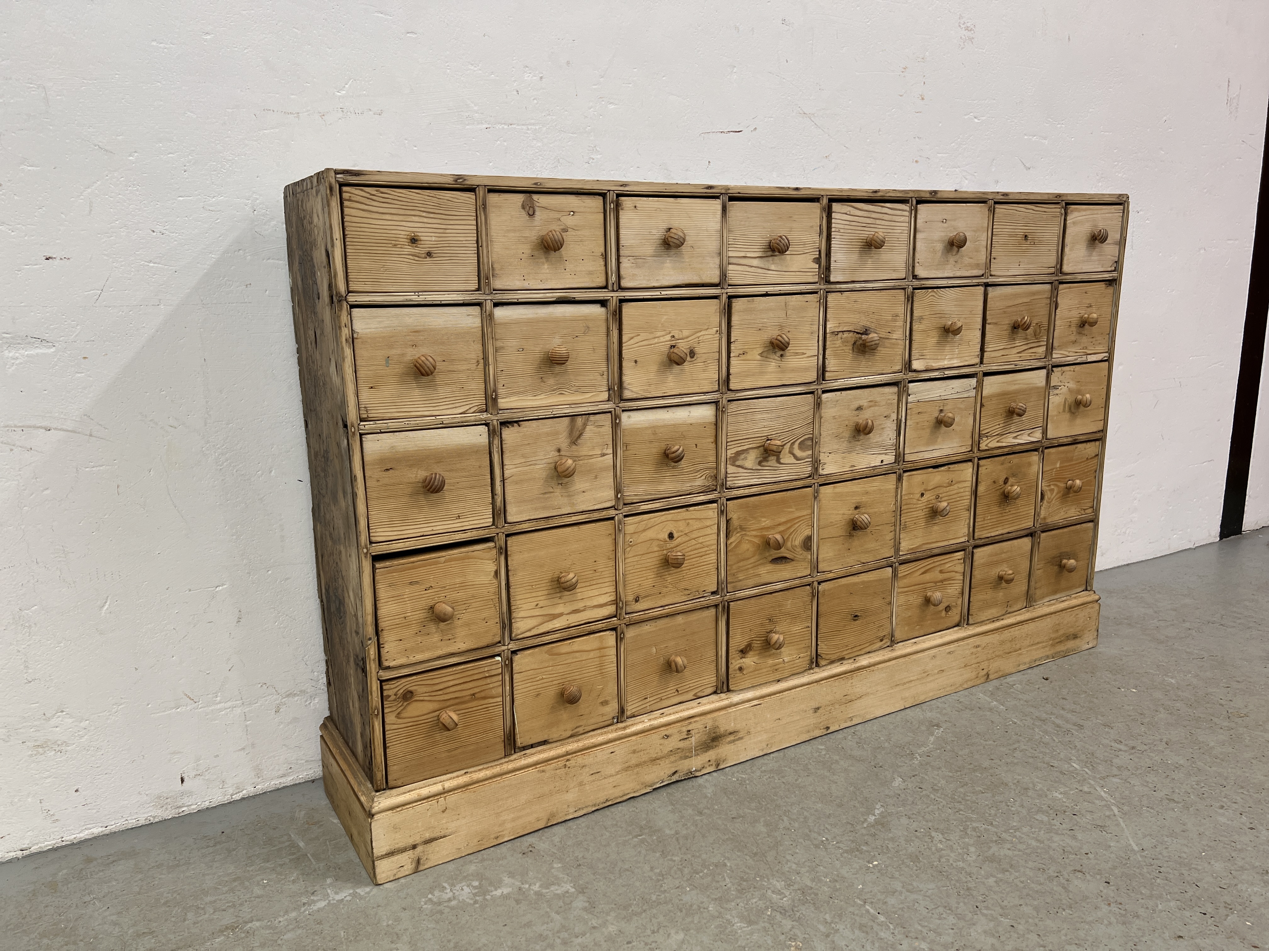 AN ANTIQUE PINE 40 DRAWER APOTHECARY / HABERDASHERY SHOP FITMENT - W 135CM X D 25CM X H 83CM. - Image 4 of 14