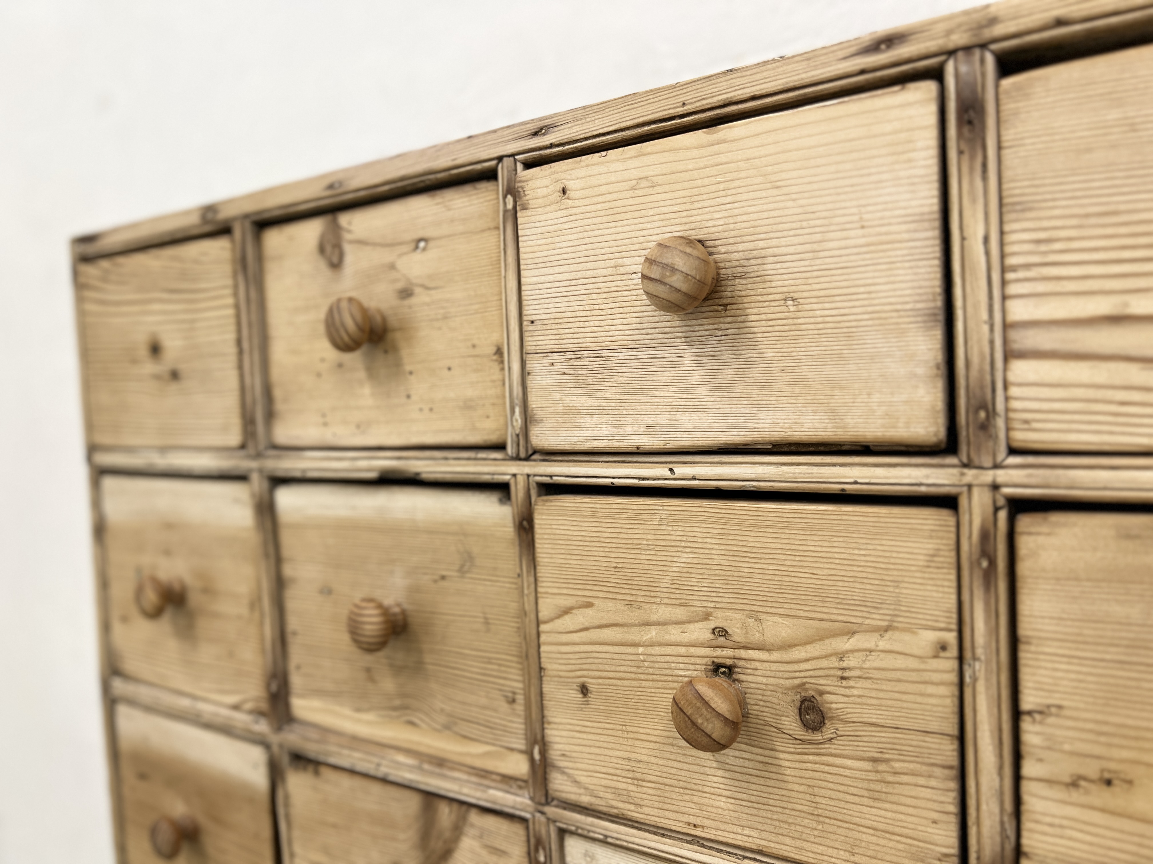 AN ANTIQUE PINE 40 DRAWER APOTHECARY / HABERDASHERY SHOP FITMENT - W 135CM X D 25CM X H 83CM. - Image 13 of 14