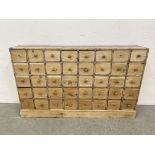 AN ANTIQUE PINE 40 DRAWER APOTHECARY / HABERDASHERY SHOP FITMENT - W 135CM X D 25CM X H 83CM.