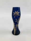 A VINTAGE BLUE GLASS VASE, WITH OVERLAYED SILVERED FLOWERS AND FOLIAGE MARKED "GALLE" H 18CM.