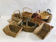 A GROUP OF ELEVEN ASSORTED VINTAGE WICKER BASKETS OF VARYING SIZES