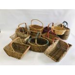 A GROUP OF ELEVEN ASSORTED VINTAGE WICKER BASKETS OF VARYING SIZES