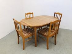 A HONEY PINE EXTENDING DINING TABLE AND 4 HONEY PINE DINING CHAIRS