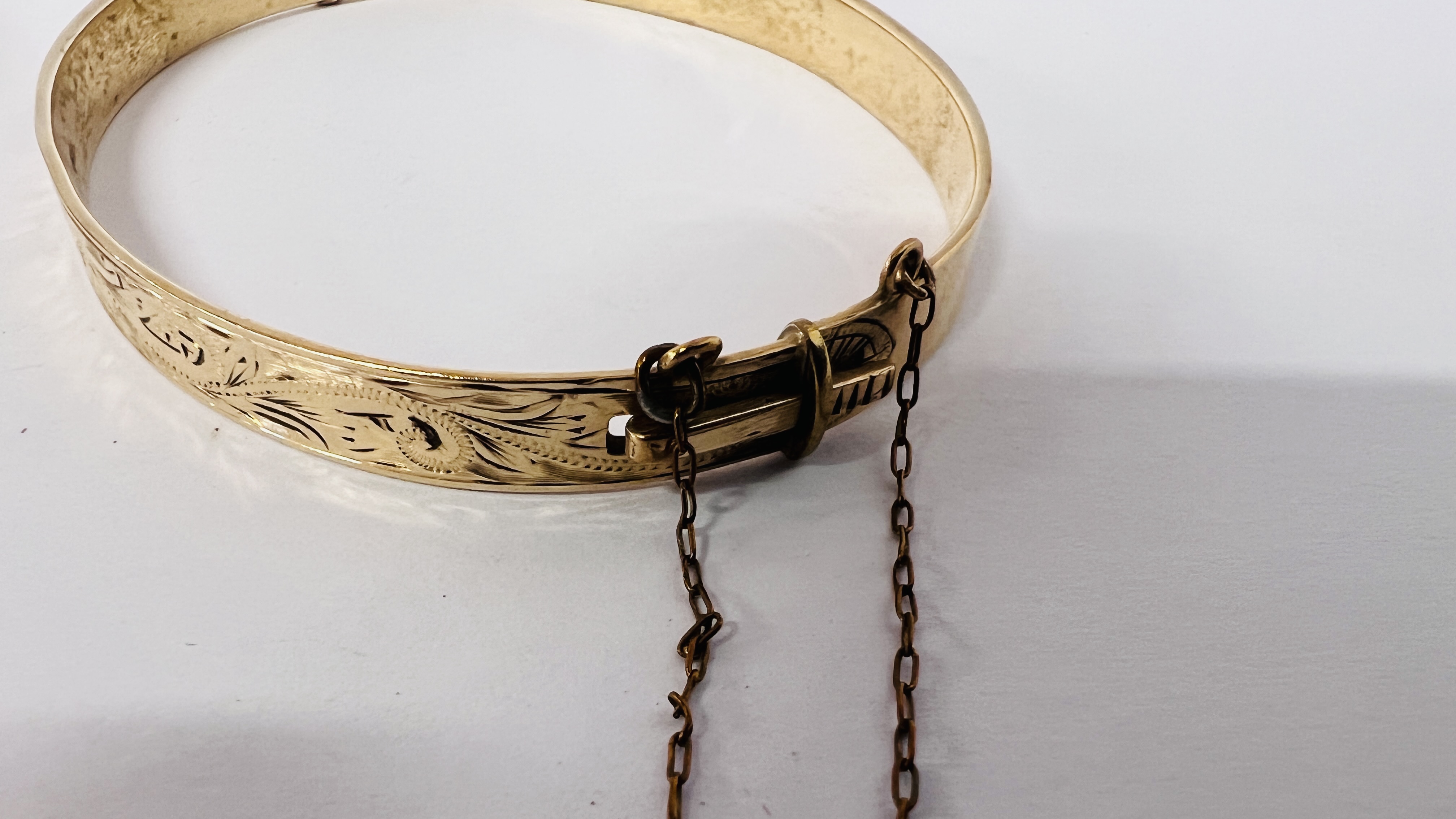 TWO GOLD TONE HINGED BANGLES. - Image 6 of 9