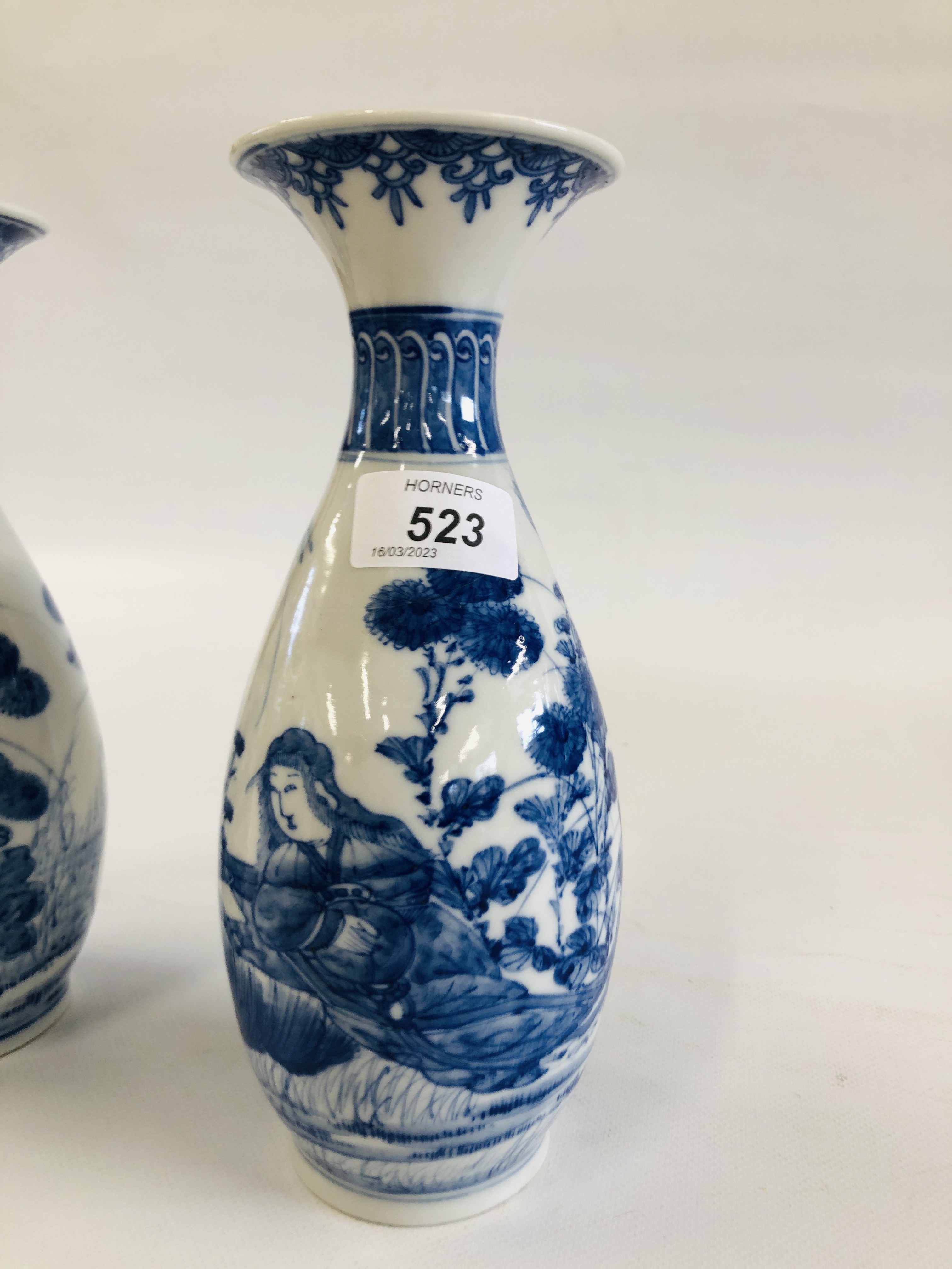 A PAIR OF DECORATIVE BLUE AND WHITE ORIENTAL VASES DEPICTING A PREGNANT WOMAN SEATED AMONGST THE - Image 4 of 13
