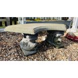 A STONEWORK GARDEN BENCH THE CURVED SEAT SUPPORTED BY DOLPHINS, LENGTH 110CM.