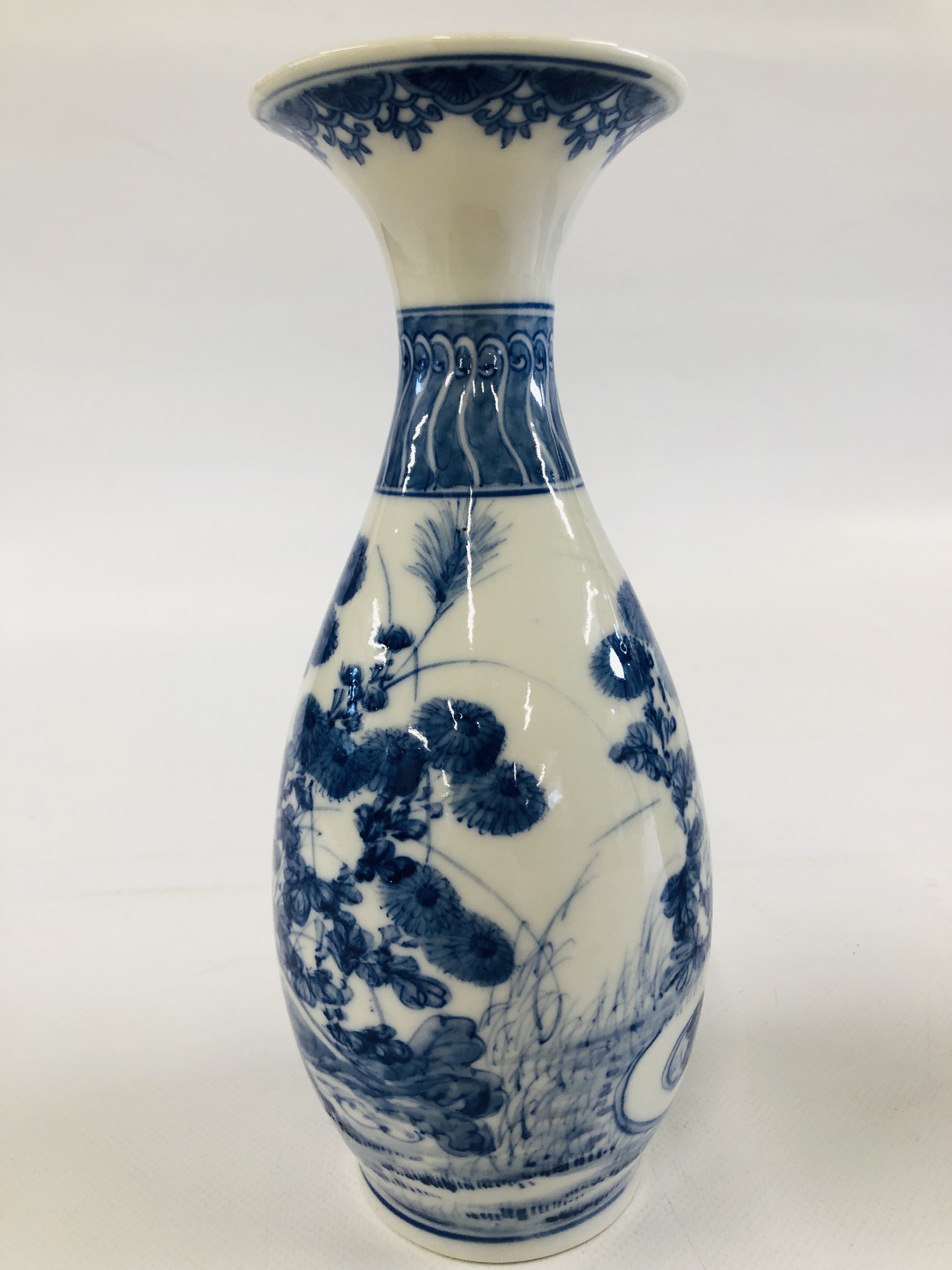 A PAIR OF DECORATIVE BLUE AND WHITE ORIENTAL VASES DEPICTING A PREGNANT WOMAN SEATED AMONGST THE - Image 12 of 13