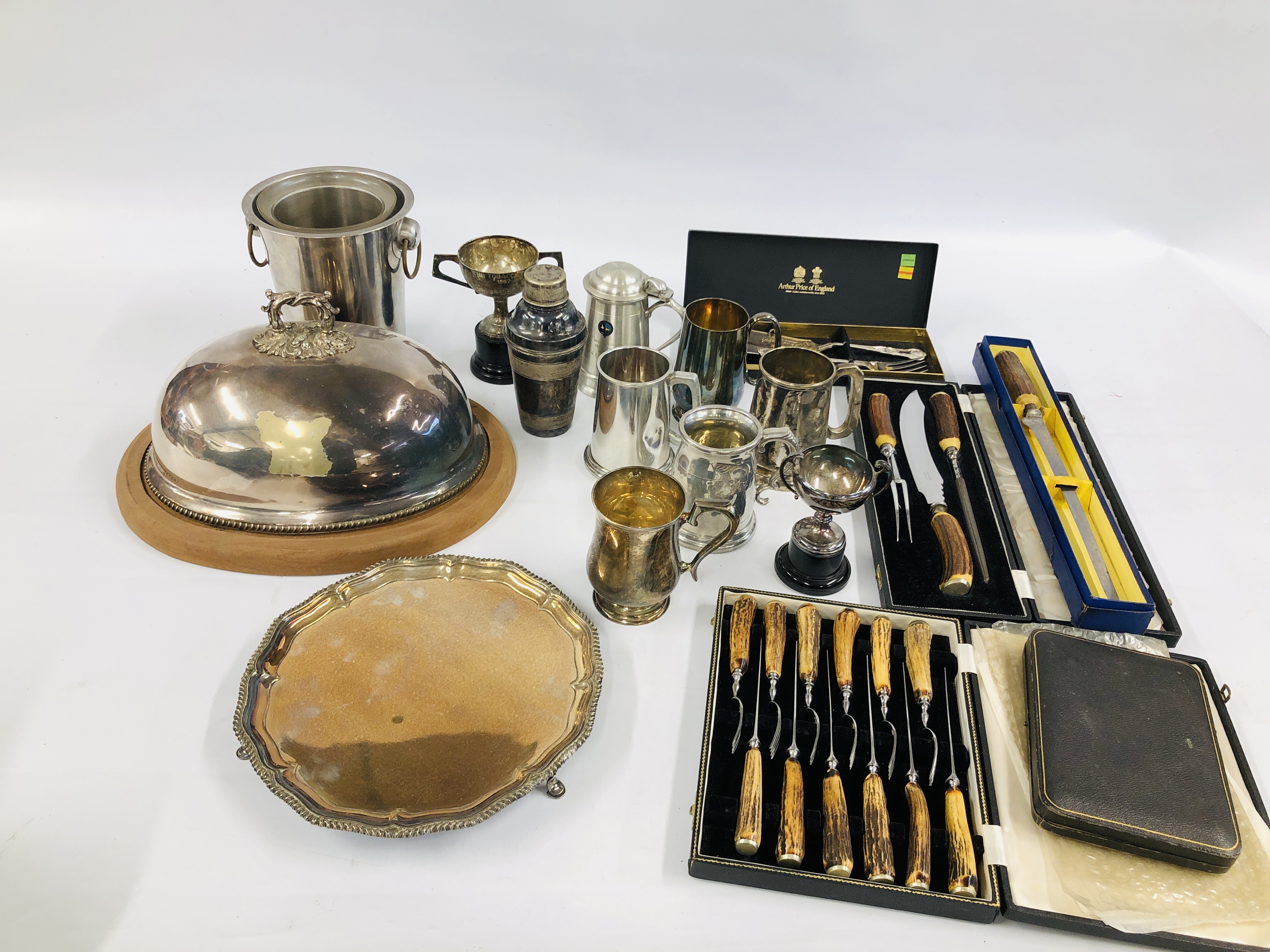 TWO BOXES OF ASSORTED PLATED WARE TO INCLUDE A COCKTAIL SHAKER, TROPHY CUPS AND TANKARDS,