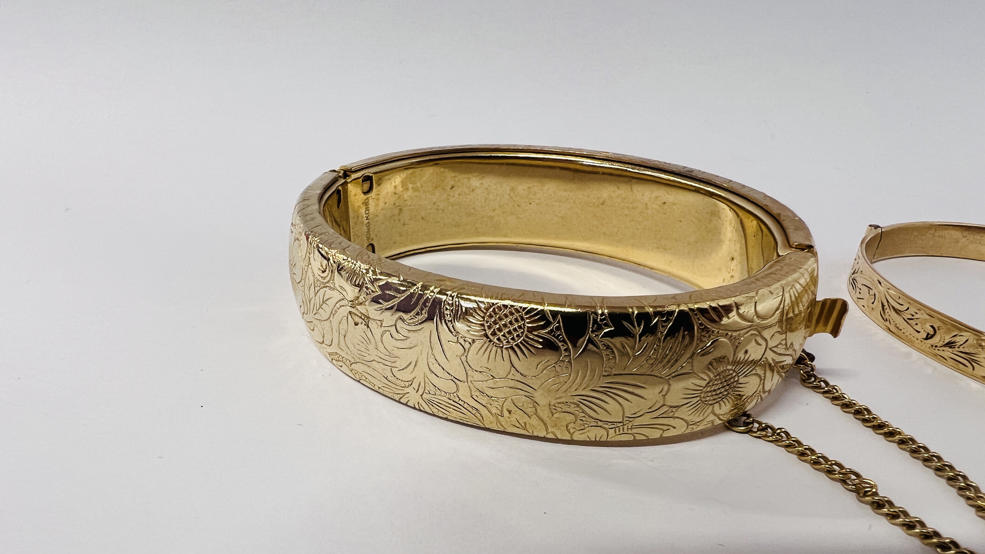 TWO GOLD TONE HINGED BANGLES. - Image 2 of 9