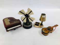 A GROUP OF 3 VINTAGE RETRO MUSICAL CLOCKWORK CIGARETTE DISPENSER AND ASH TRAY FORMED AS A TABLE