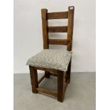 A CHUNKY SOLID PINE LADDER BACK HALL CHAIR, WAXED FINISH.