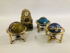 THREE METAL FRAMED GEM STONE GLOBES AND A BOXED MELODY IN MOTION GOLDEN MOUNTAIN CLOCK