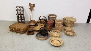A GROUP OF ASSORTED WICKER BASKETS AND BINS,