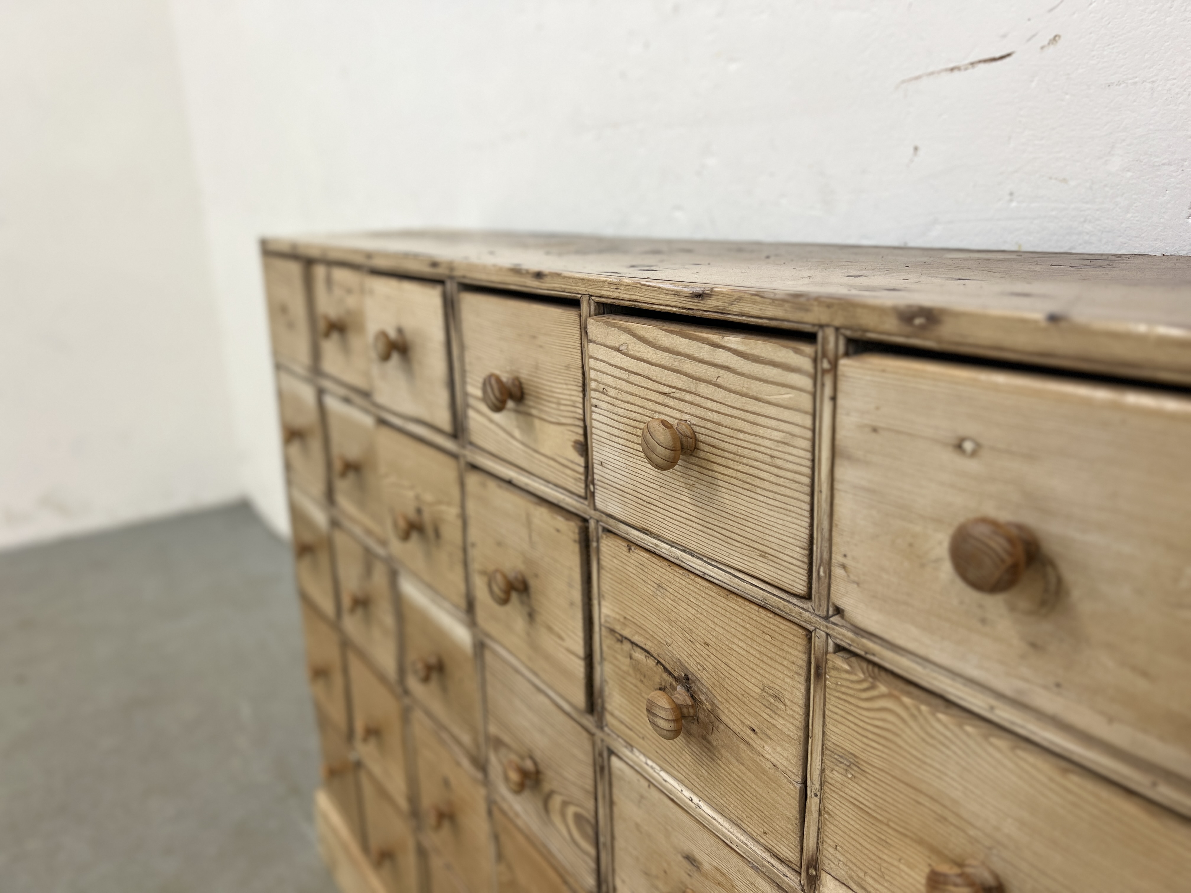 AN ANTIQUE PINE 40 DRAWER APOTHECARY / HABERDASHERY SHOP FITMENT - W 135CM X D 25CM X H 83CM. - Image 9 of 14