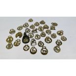 A COLLECTION OF 33 VINTAGE HORSE BRASSES.