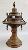 AN IMPRESSIVE MIDDLE EASTERN COPPER AND BRASS BRAZIER WITH BRASS BIRD FINIAL, H 70CM.