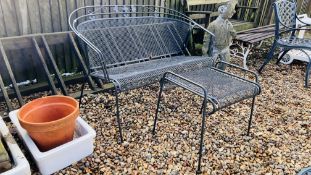 A METAL WORK GARDEN COMPANION SEAT ALONG WITH MATCHING TABLE.