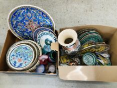 A GROUP OF MODERN EARTHEN WARE PLATES AND CHARGERS MAINLY WITH MIDDLE EASTERN DESIGNS.