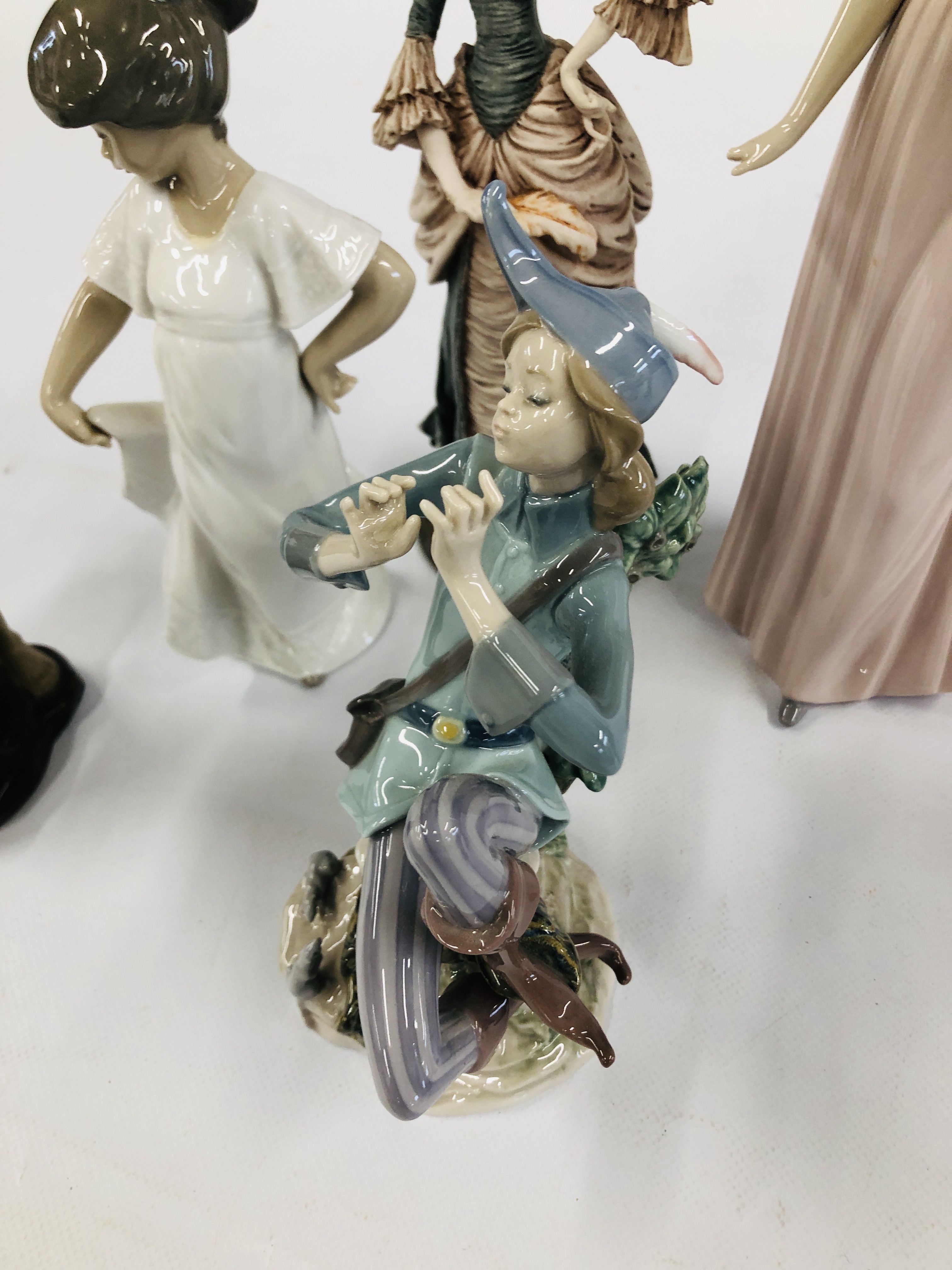 A GROUP OF SEVEN FIGURINES TO INCLUDE LLADRO PETER PAN (PIPE MUSING), NAO DANCING CHILD, - Image 4 of 10