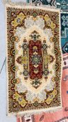 4 X VARIOUS RUGS OF DIFFERENT DESIGNS AND SIZES, THE LARGEST 290CM X 140CM.