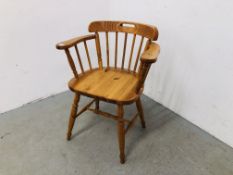 A PINE CAPTAINS STYLE CHAIR