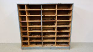 A VINTAGE PIGEON HOLE STYLE HABERDASHERY CABINET A/F.