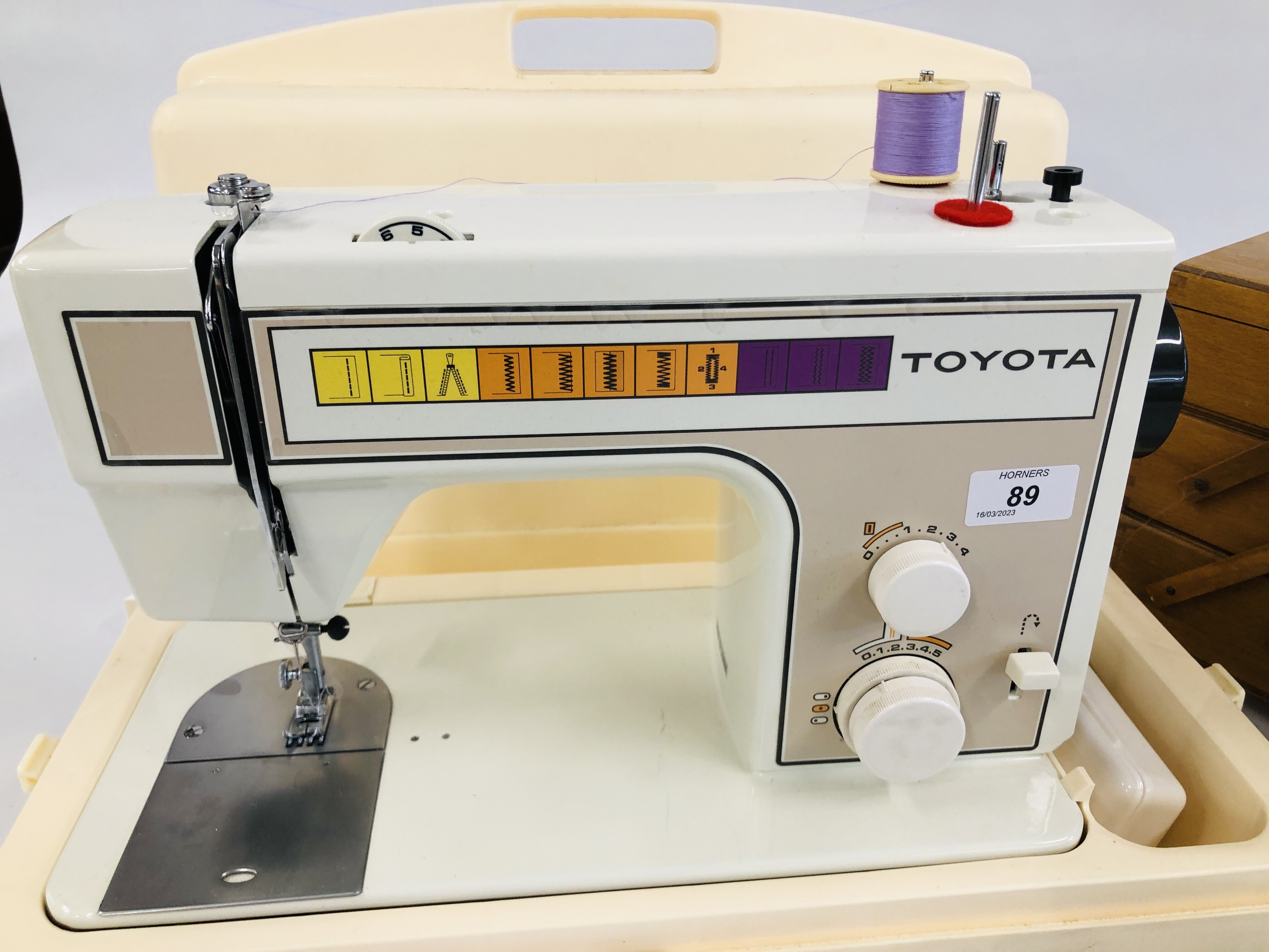 A TOYOTA 221 ELECTRIC SEWING MACHINE IN CASE WITH FOOT PEDAL AND CANTILEVER SEWING BOX WITH - Image 2 of 9