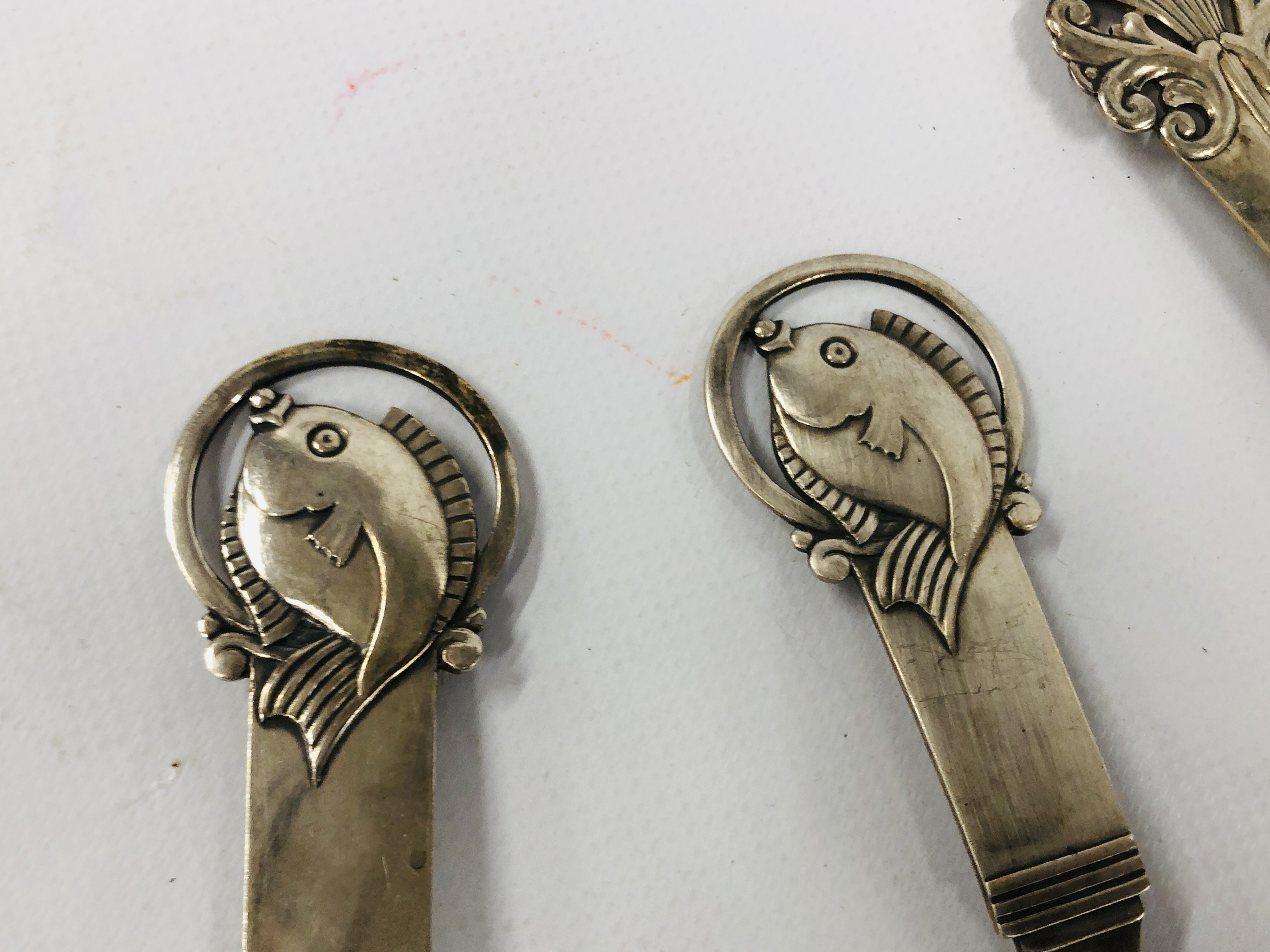 A PAIR OF CONTINENTAL WHITE METAL FISH SERVERS MAKERS SJ ALONG WITH A FURTHER SERVING SPOON BY THE - Image 3 of 11