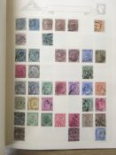 AN ALL WORLD COLLECTION STAMPS IN SEVEN VOLUMES AND LOOSE, GERMANY, INDIA, GB ETC.