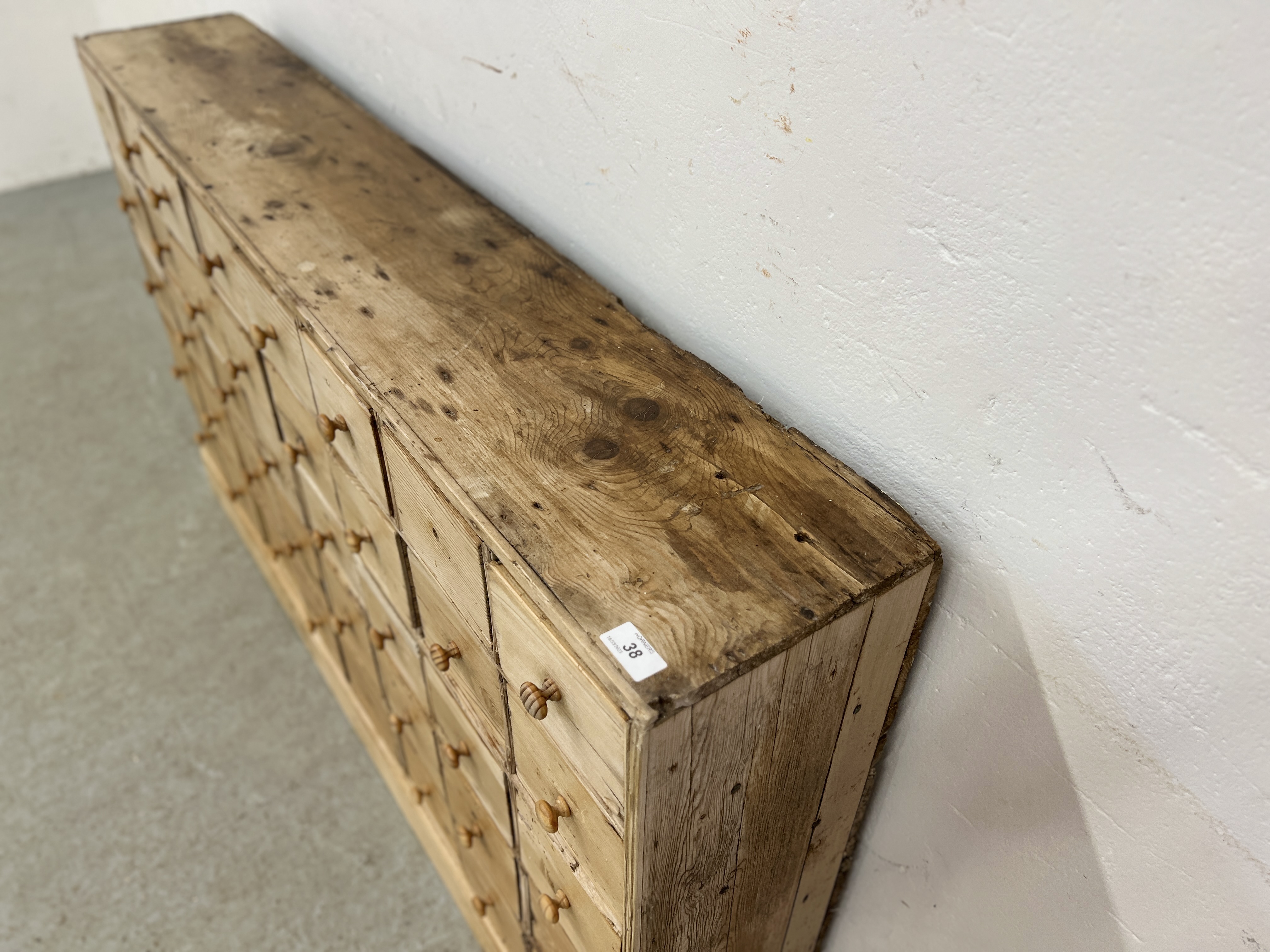 AN ANTIQUE PINE 40 DRAWER APOTHECARY / HABERDASHERY SHOP FITMENT - W 135CM X D 25CM X H 83CM. - Image 7 of 14