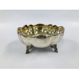 A SILVER AND GILT FRUIT BOWL, CIRCULAR LOBED MOLDED BORDER ON FOUR OPENWORK SCROLL FEET, DIA.