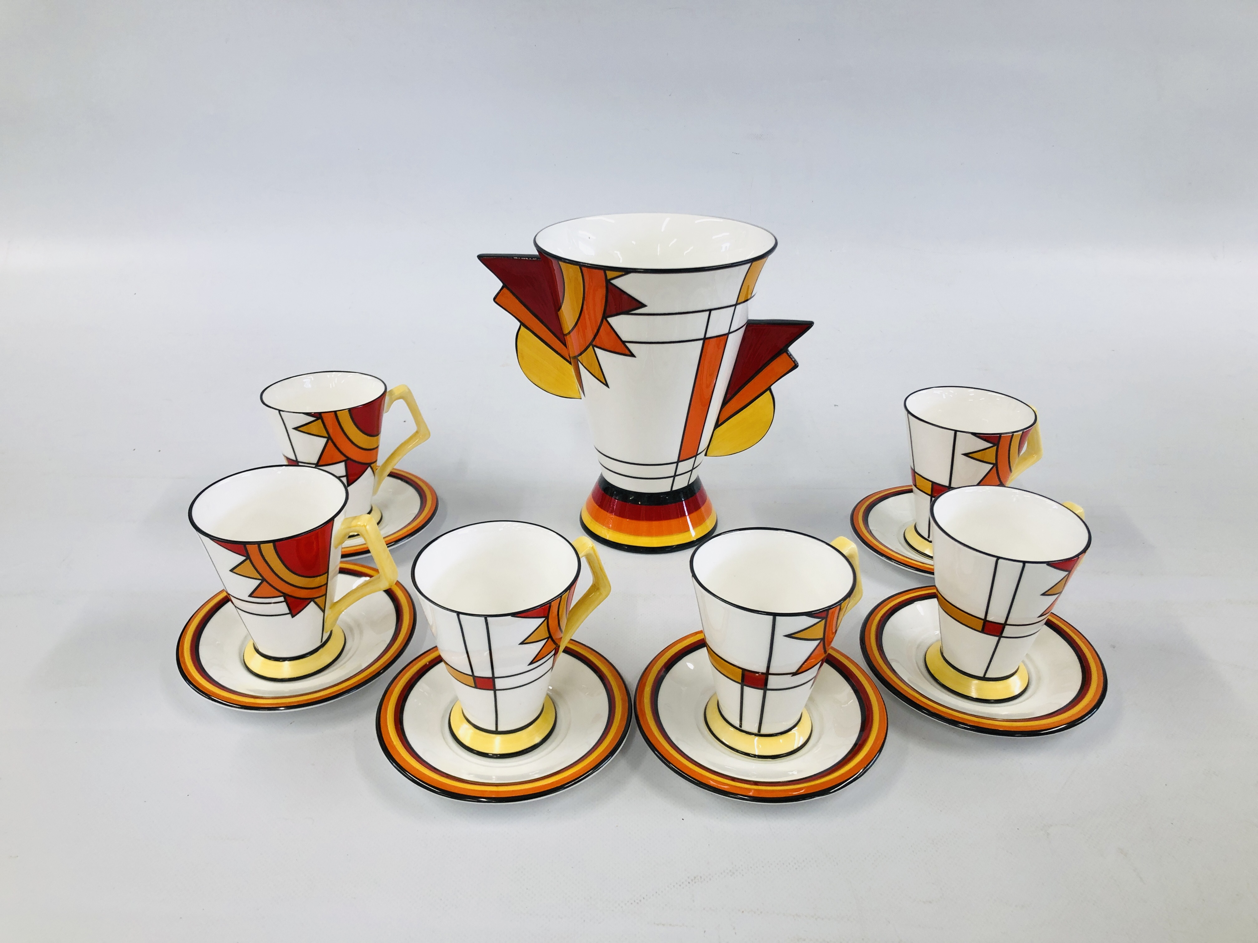 A MODERN ABSTRACT DESIGN 12 PIECE COFFEE CUP SET BY "THE BRIAN WOOD COLLECTION" ALONG WITH A LARGE