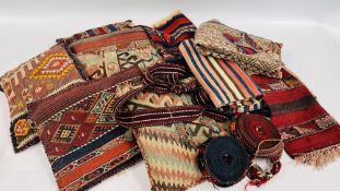 A BOX OF MIDDLE EASTERN AND ASIAN STYLE CARPET / HANDCRAFTED TEXTILE CUSHIONS AND A BOX OF TEXTILE