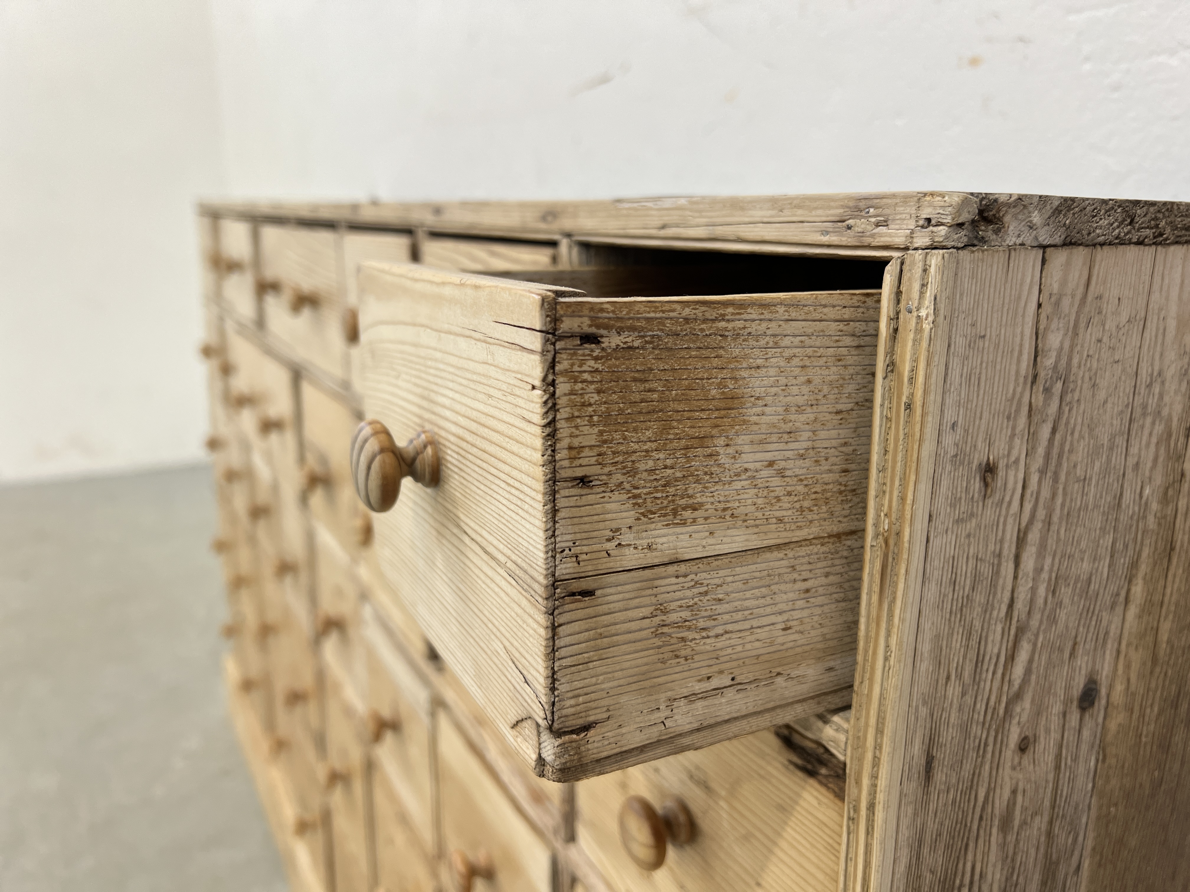 AN ANTIQUE PINE 40 DRAWER APOTHECARY / HABERDASHERY SHOP FITMENT - W 135CM X D 25CM X H 83CM. - Image 10 of 14