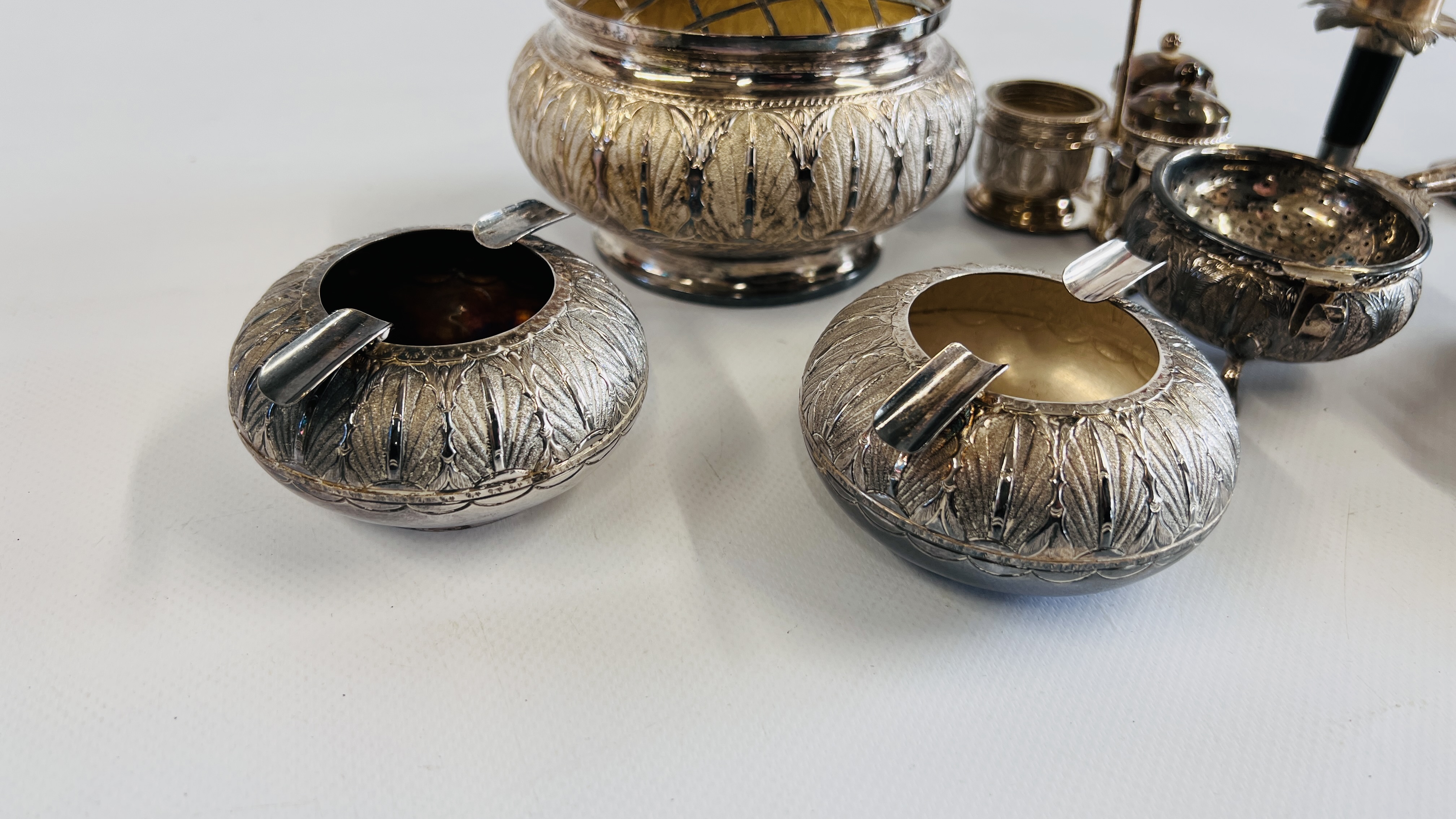 A GROUP OF INDIAN WHITE METAL DECORATIVE WARES ALL WITH MATCHING EMBOSSED DESIGN TO INCLUDE PAIR OF - Image 3 of 7