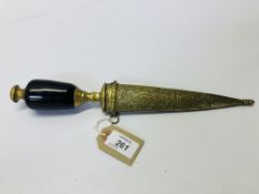 A DECORATIVE CEREMONIAL DAGGER IN BRASS SCABBARD