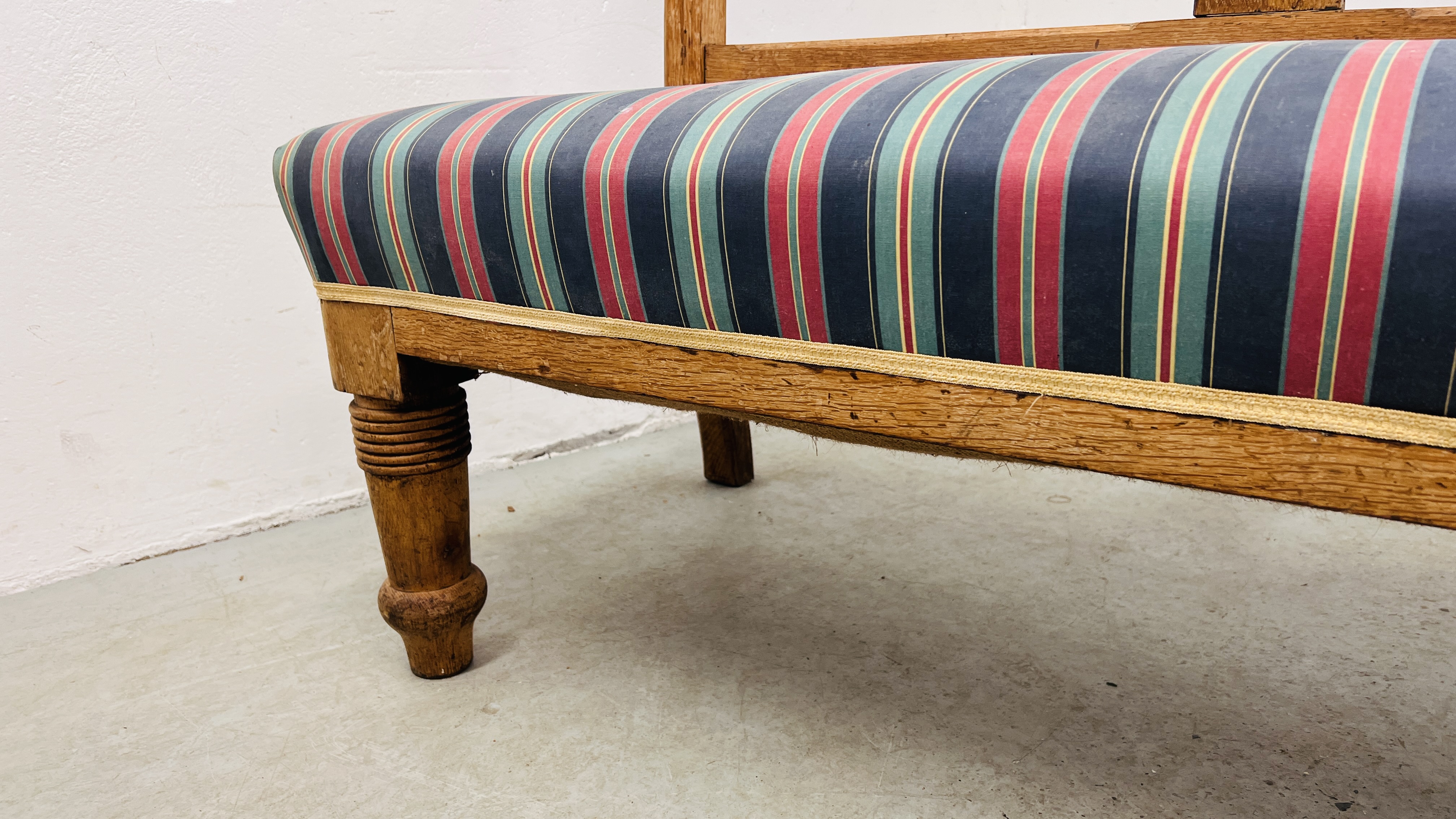 AN ANTIQUE OAK WAITING ROOM BENCH BEARING TREVOR PAGE & Co NORWICH CABINET MAKER LABEL, - Image 6 of 16