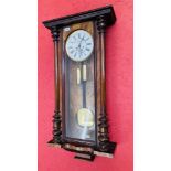 A VIENNA STYLE MAHOGANY CASED STRIKING WALL CLOCK,