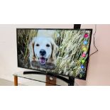 LG 49" FLAT SCREEN TV MODEL 49UH661V WITH REMOTE - SOLD AS SEEN.