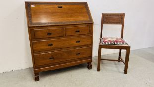 AN ORIENTAL STYLE MAHOGANY FOUR DRAWER WRITING BUREAU WITH FITTED INTERIOR AND HAND CARVED DETAIL