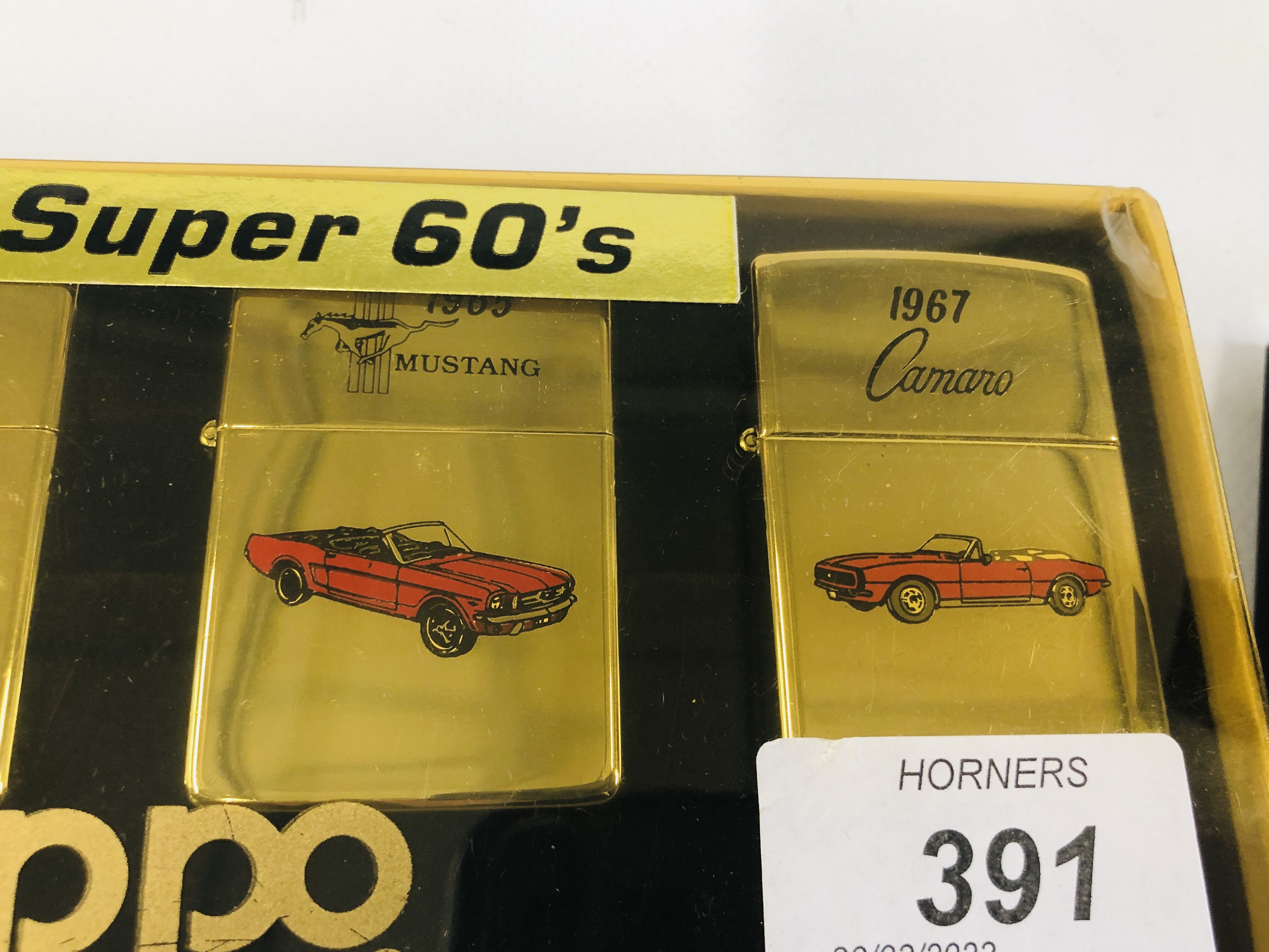 A BOXED "THE SUPER 60'S" ZIPPO LIGHTER SET ALONG WITH ONE FURTHER CORVETTE EXAMPLE. - Image 3 of 4